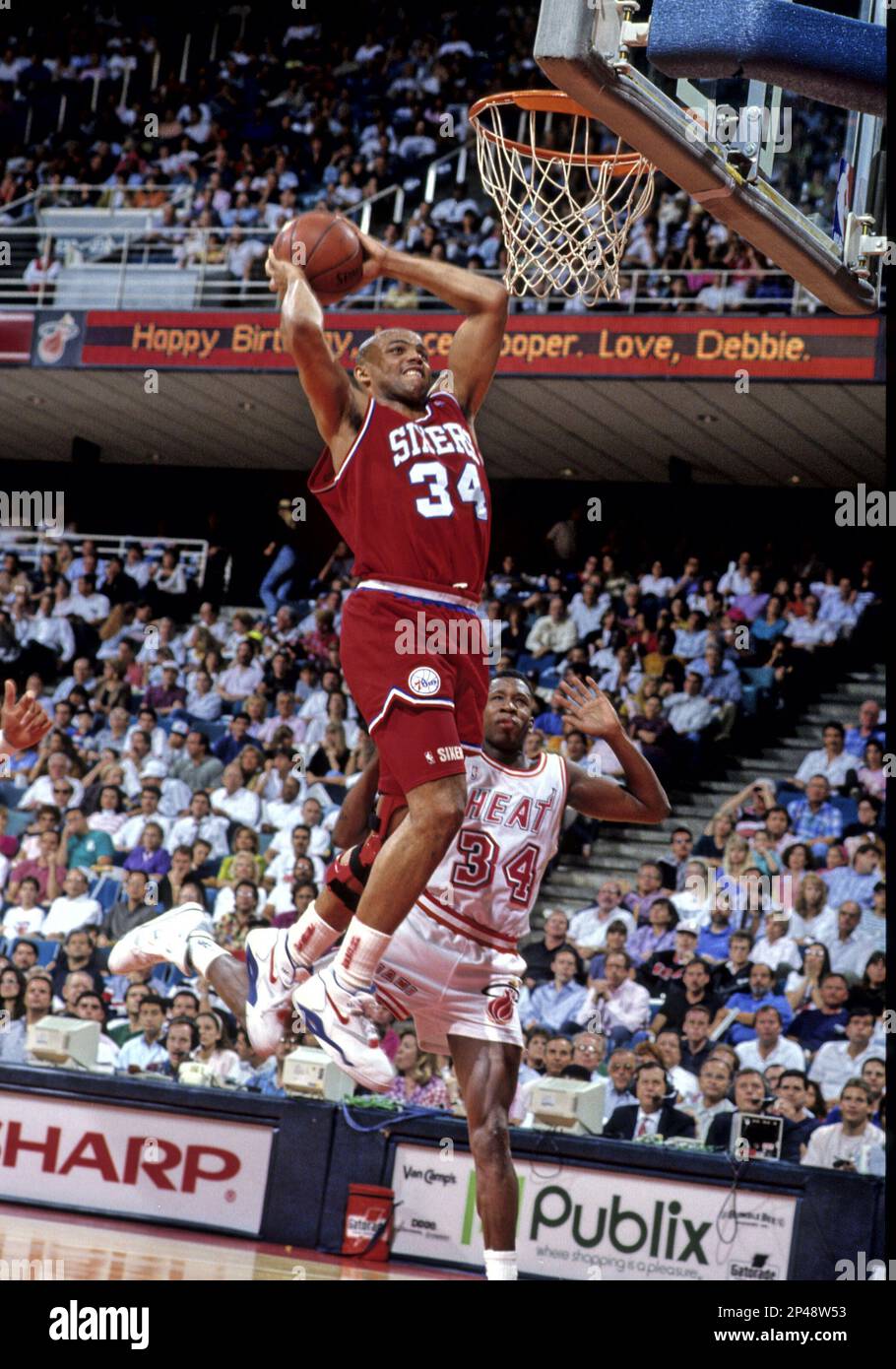 Philadelphia 76ers forward Charles Barkley dunks for a basket against ...