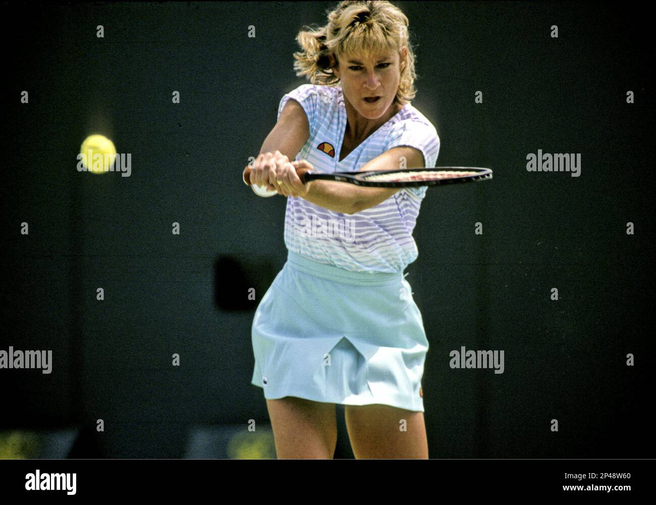 Chris Evert competes in the Lipton Tennis Tournament in 1988. (AP Photo