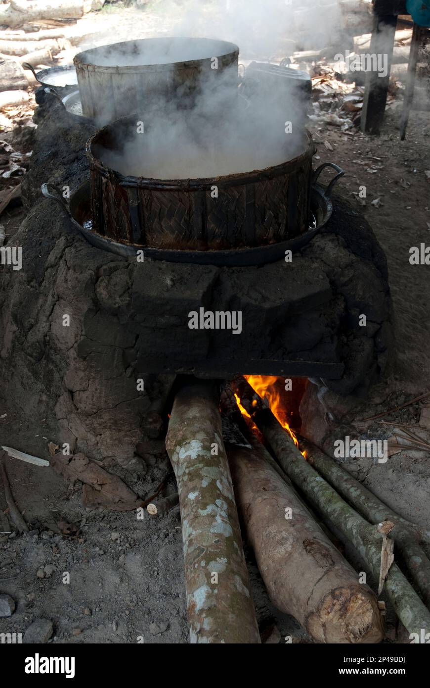 Pot of boiling palm sugar, Palm sugar factory, near Sukamade, East Java, Indonesia Stock Photo