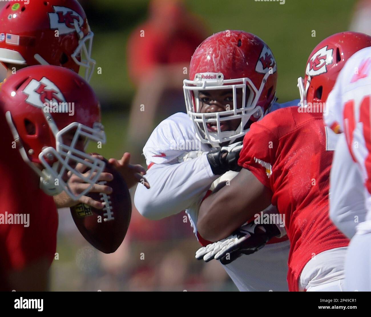 Kansas City Chiefs defensive tackle Dontari Poe, center, rushes