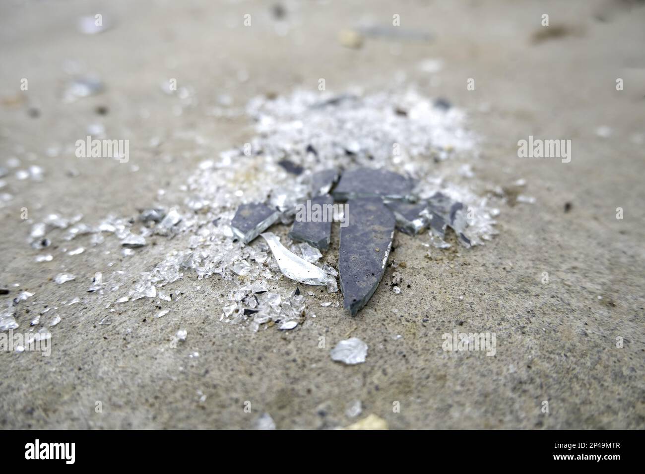 Detail of broken mirror thrown in the trash, dirt and pollution Stock Photo Alamy