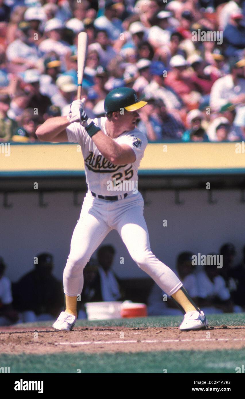 Oakland A's Mark McGwire(25) in action during a game from his 1988 season  at Oakland-Alameda County Coliseum in Oakland, California. Mark McGwire  played for 16 years with 2 different teams, was a