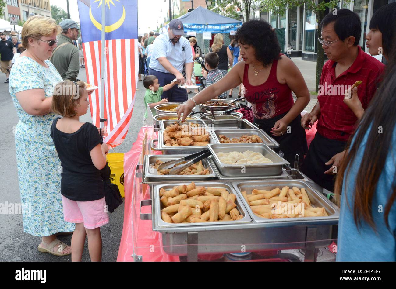 People order food from Flavours of Malaysia, one of the many food