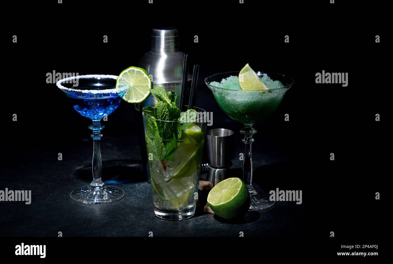 Set of various colorful cocktails on black background. Classic long drink cocktails menu concept. Stock Photo