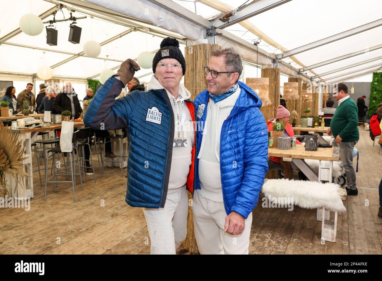 Heringsdorf, Germany. 05th Mar, 2023. Wolfgang Lippert (l) and Wolfram Becker arrive at the final day of the 'Baltic Lights' - sled dog race on the island of Usedom. Credit: Gerald Matzka/dpa/Alamy Live News Stock Photo