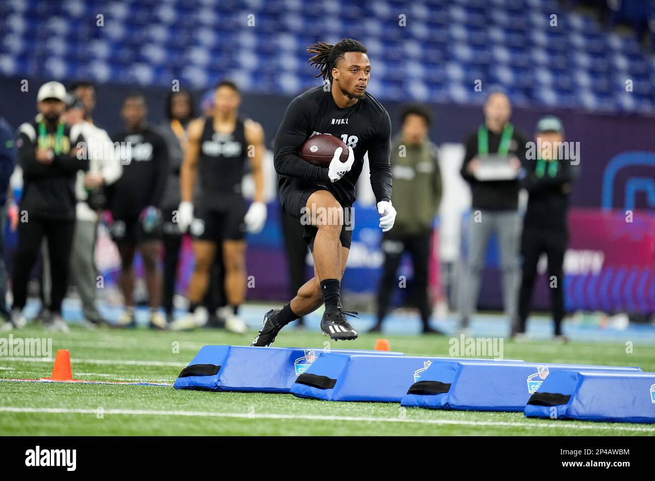 East Carolina running back Keaton Mitchell runs a drill at the NFL