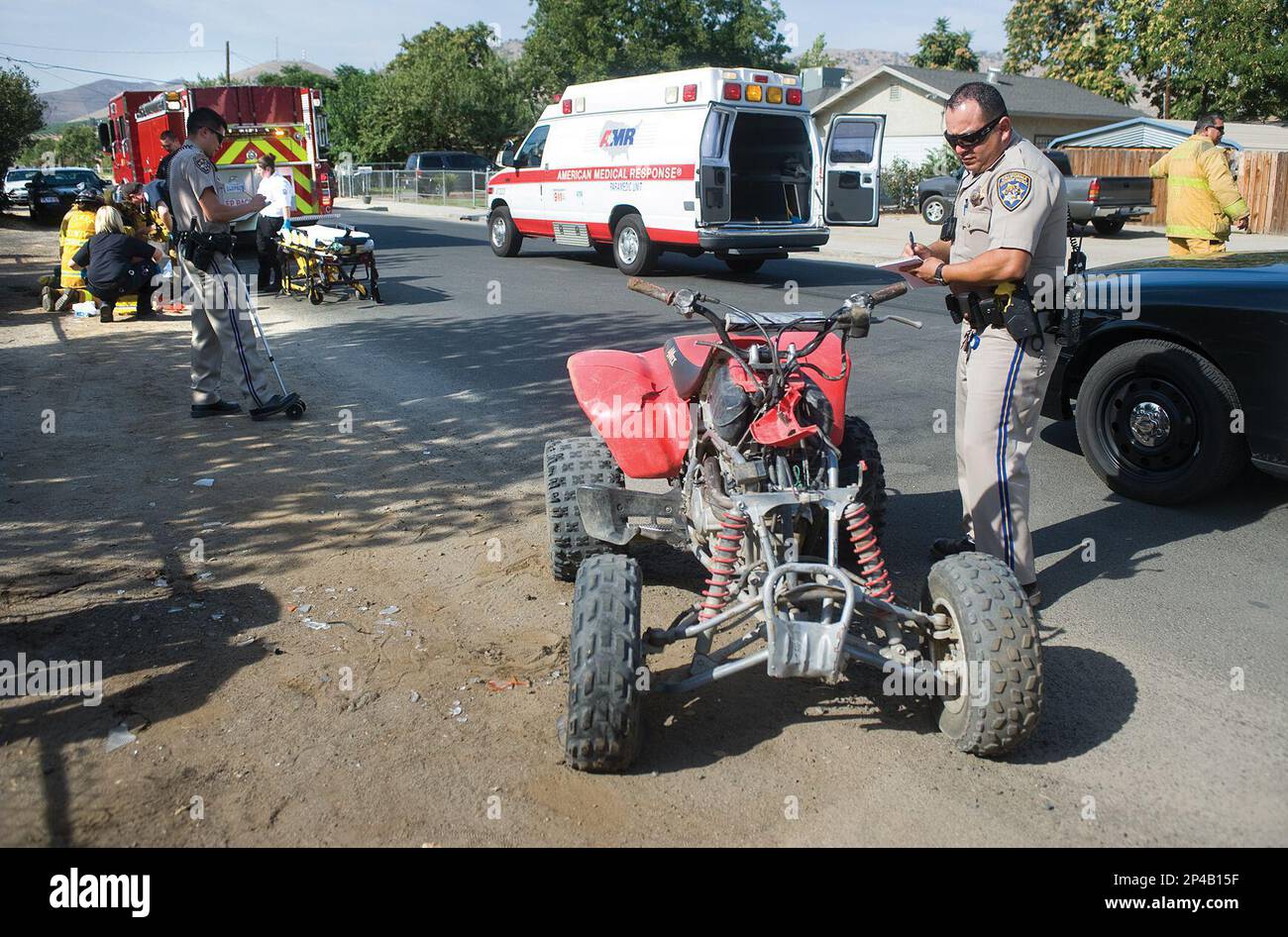 California Highway Patrol officers investigate the scene of an all