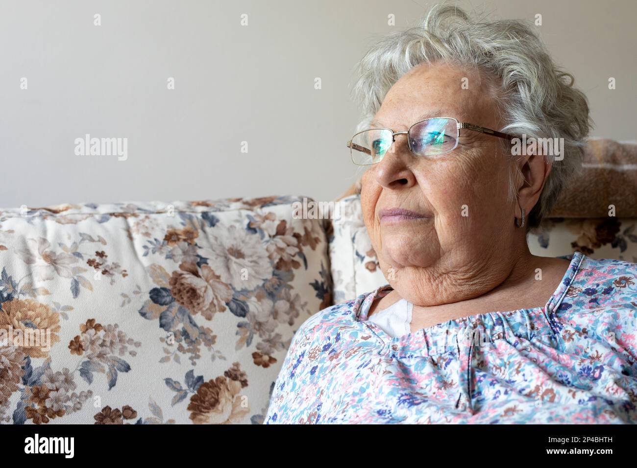 Sad, tired, ill, sick, lonely, disappointed, caucasian, old, elderly, senior woman Stock Photo