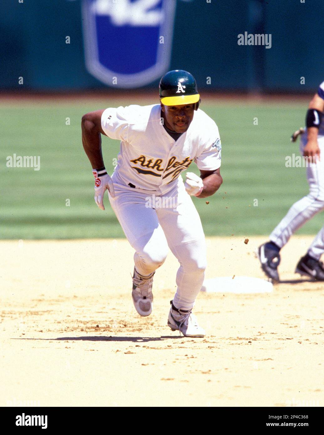 Oakland A's Rickey Henderson(35) during a game from the 1984 season at  Fenway Park in Boston, Massachusetts. Rickey Henderson played for 25 years  with 9 different teams and was inducted to the