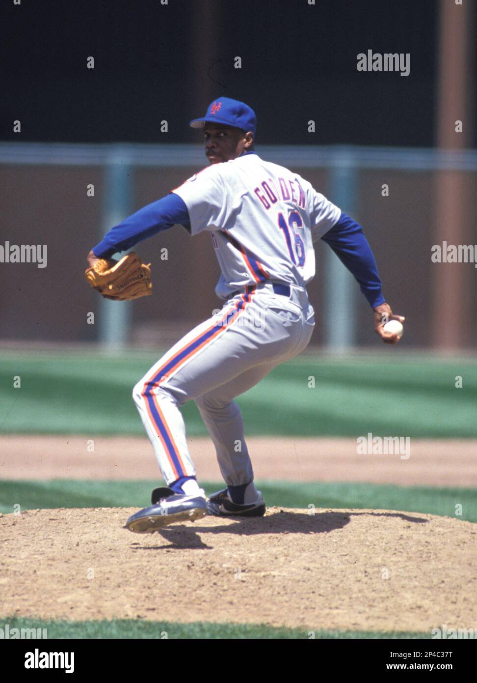 New York Mets Dwight Gooden (16) in action during a game from the 1987  season with the New York Mets at Shea Stadium in Flushing Meadows, New York.  Dwight Gooden played for