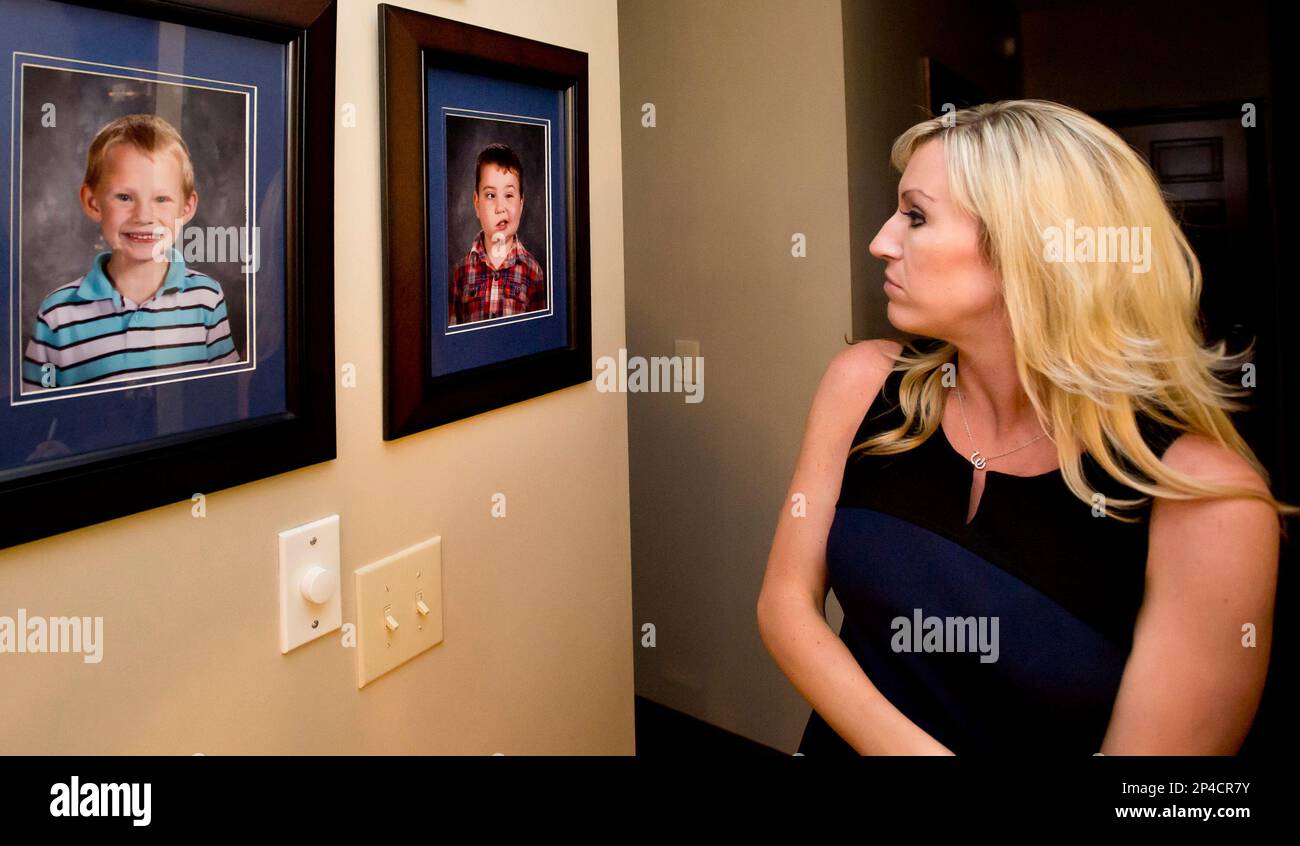 In this June 10, 2014 photo, Lynn Whittington looks at In this June 10, 2014 photo, Lynn Whittington looks at