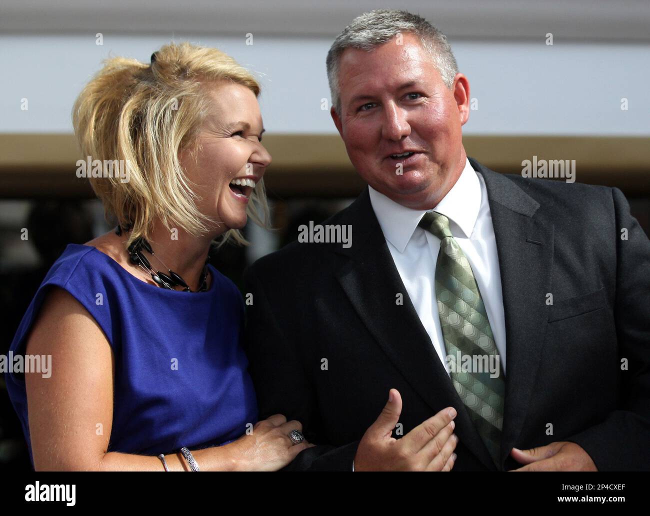 Driscoll superintendent Cynthia Garcia (left) laughs with Taft  superintendent Chad Kelly Wednesday, June 18, 2014, after Kelly was  announced as the superintendent of the year by the Education Service Center  Region 2