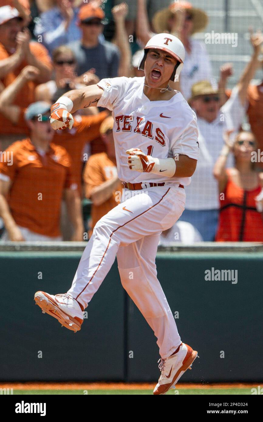 Texas Longhorns catcher Tres Barrera (1) celebrates after scoring a run  during the NCAA Super Regional baseball game against the Houston Cougars on  June 7, 2014 at UFCU Disch–Falk Field in Austin,, image size:866x1390
