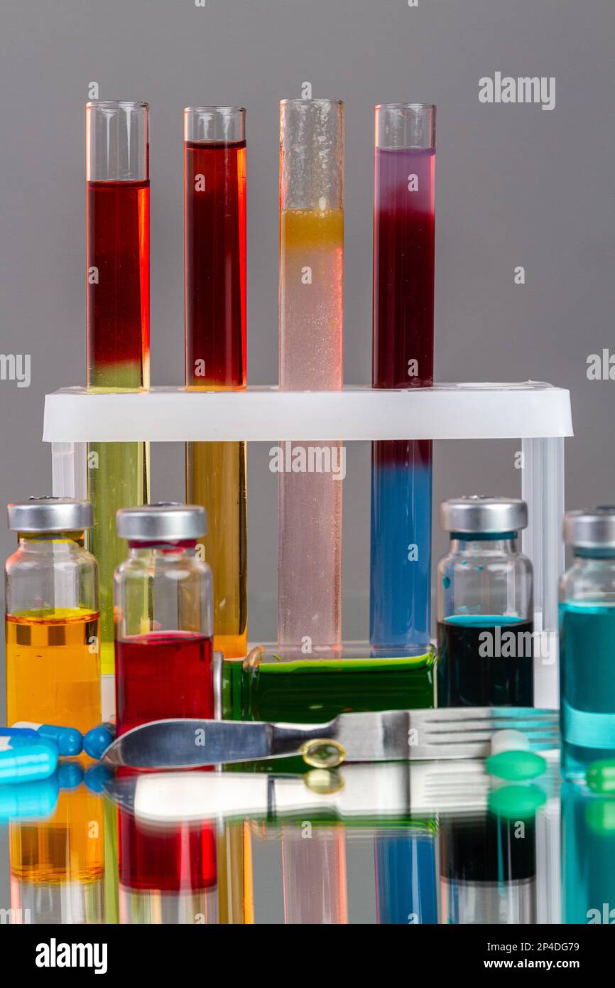 Test tubes and bottles with various colored liquids. Scientific lab ...
