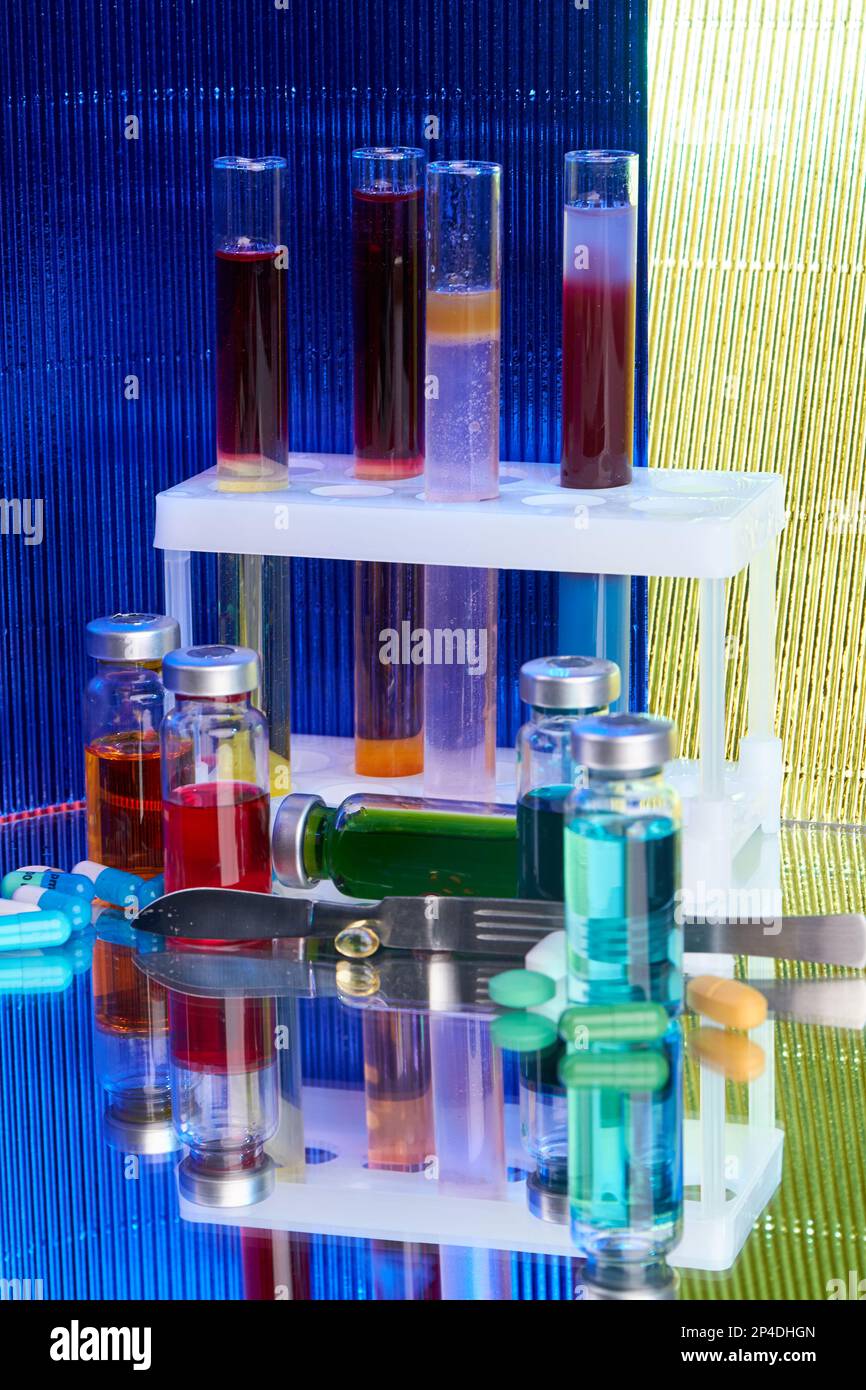 Lab test tubes and bottles with colored substance. Concept of laboratory medicine research Stock