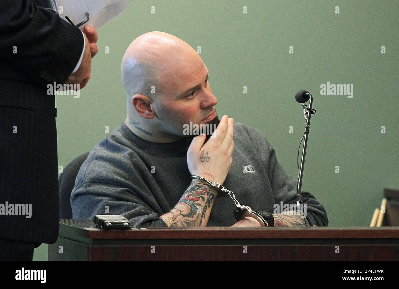 Jared Remy, son of Boston Red Sox baseball broadcaster Jerry Remy, sits in  Middlesex Superior Court during a hearing Tuesday, May 27, 2014, in Woburn,  Mass. Remy, 35, pleaded guilty to first-degree murder and other charges for  stabbing his girlfriend