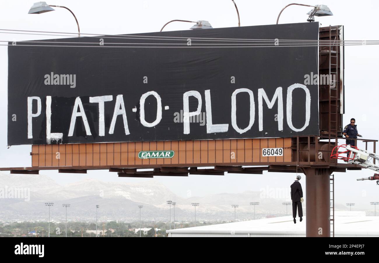An El Paso, Texas police officer checks a makeshift mannequin Thursday