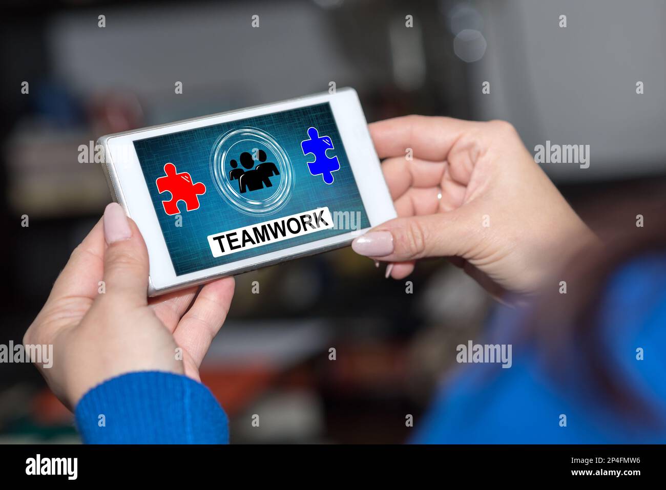 Smartphone screen displaying a teamwork concept Stock Photo - Alamy
