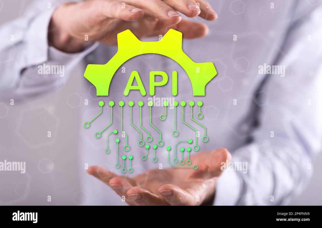 Api concept between hands of a man in background Stock Photo
