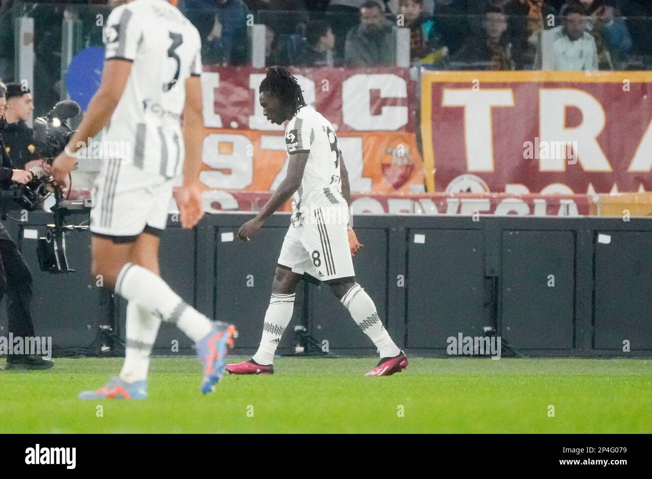 Juventus' Jean Keane leaves the pitch after being shown with a red card
