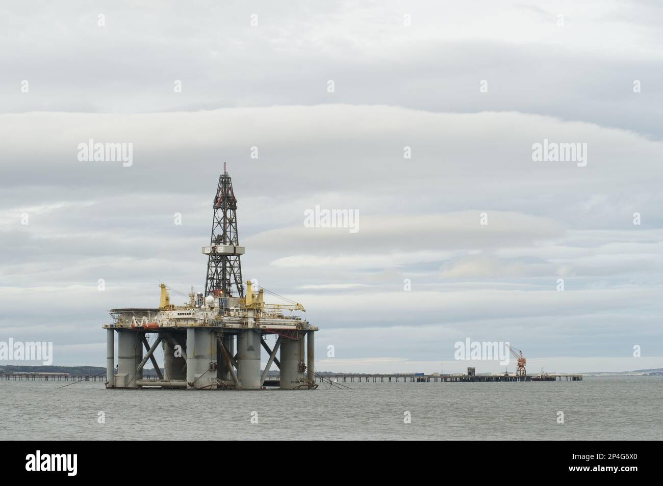 Oil rig moored in sea near coast, Cromarty Firth, Moray Firth, Invergordon, Easter Ross, Scotland, United Kingdom Stock Photo