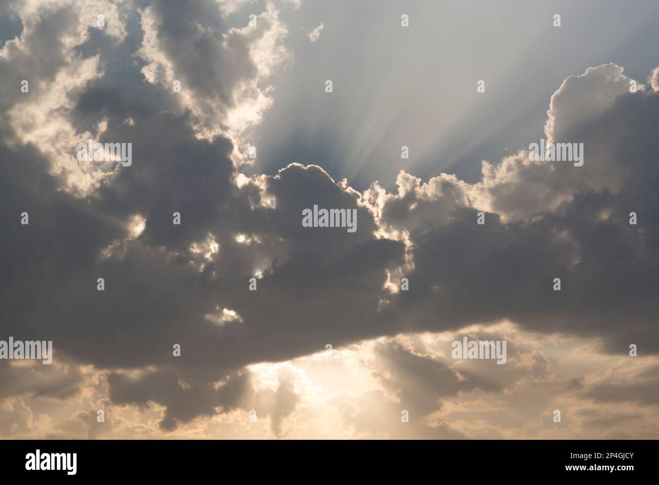 Cyprus, crepuscular rays creating dramatic looking clouds near Pathos. Stock Photo