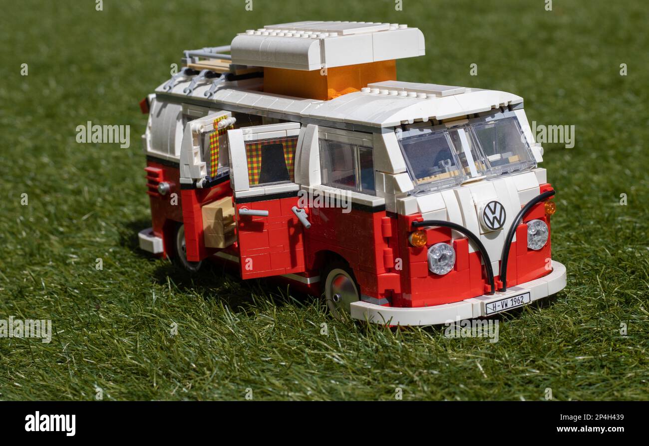 Traffic jam overrun tsunami VW transporter lego model on grass Stock Photo - Alamy
