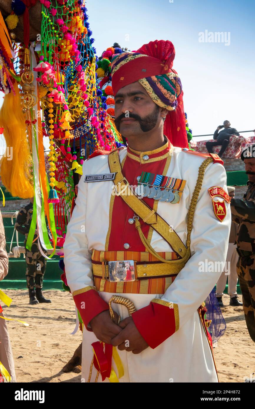 India, Rajasthan, Bikaner, National Camel Research Centre, Camel Festival, Border Security Force soldier in dress uniform Stock Photo