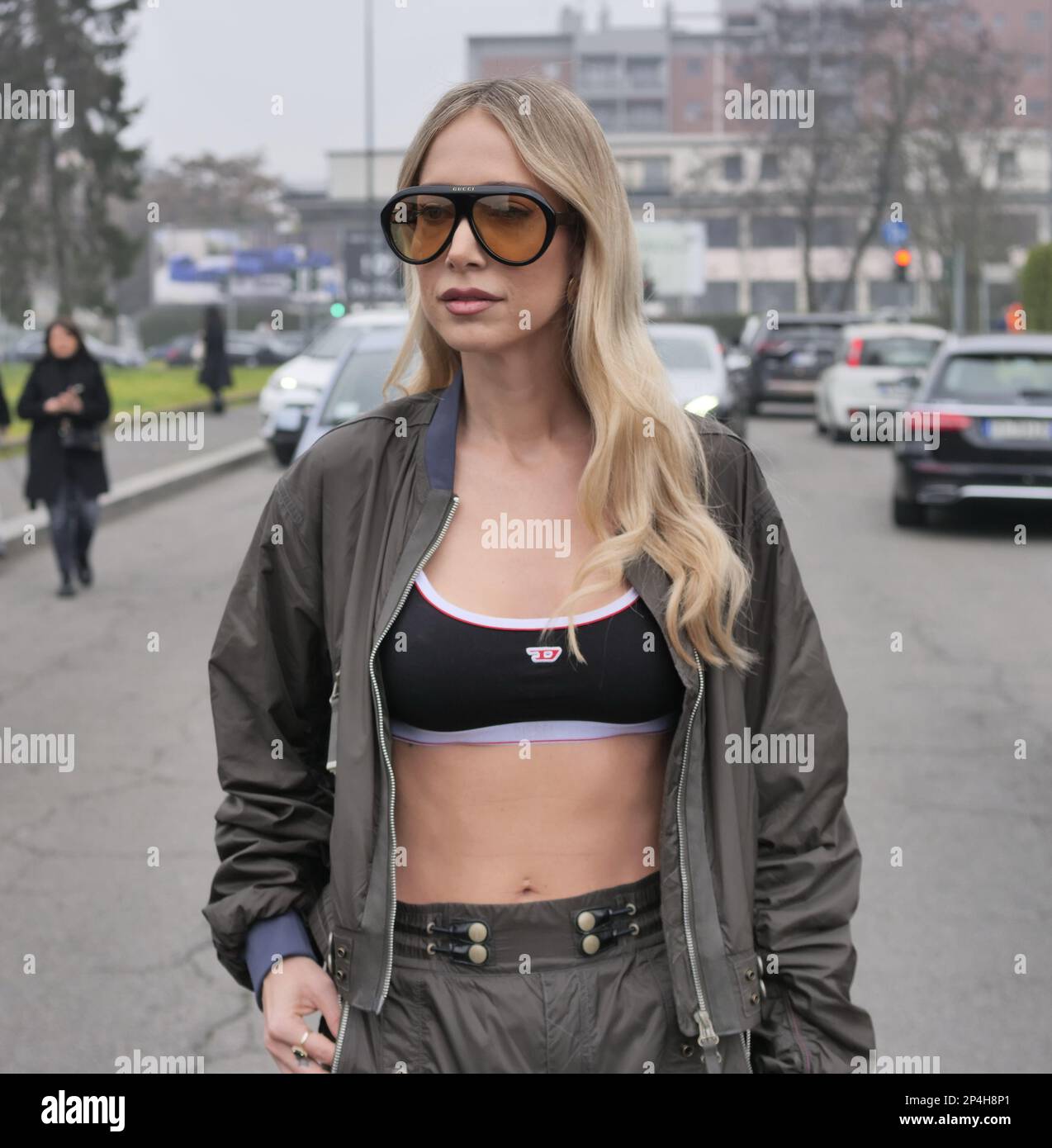 Fashion blogger posing for photographers before Diesel fashion show during  Milano fashion week fall winter 2023/2024 Stock Photo - Alamy