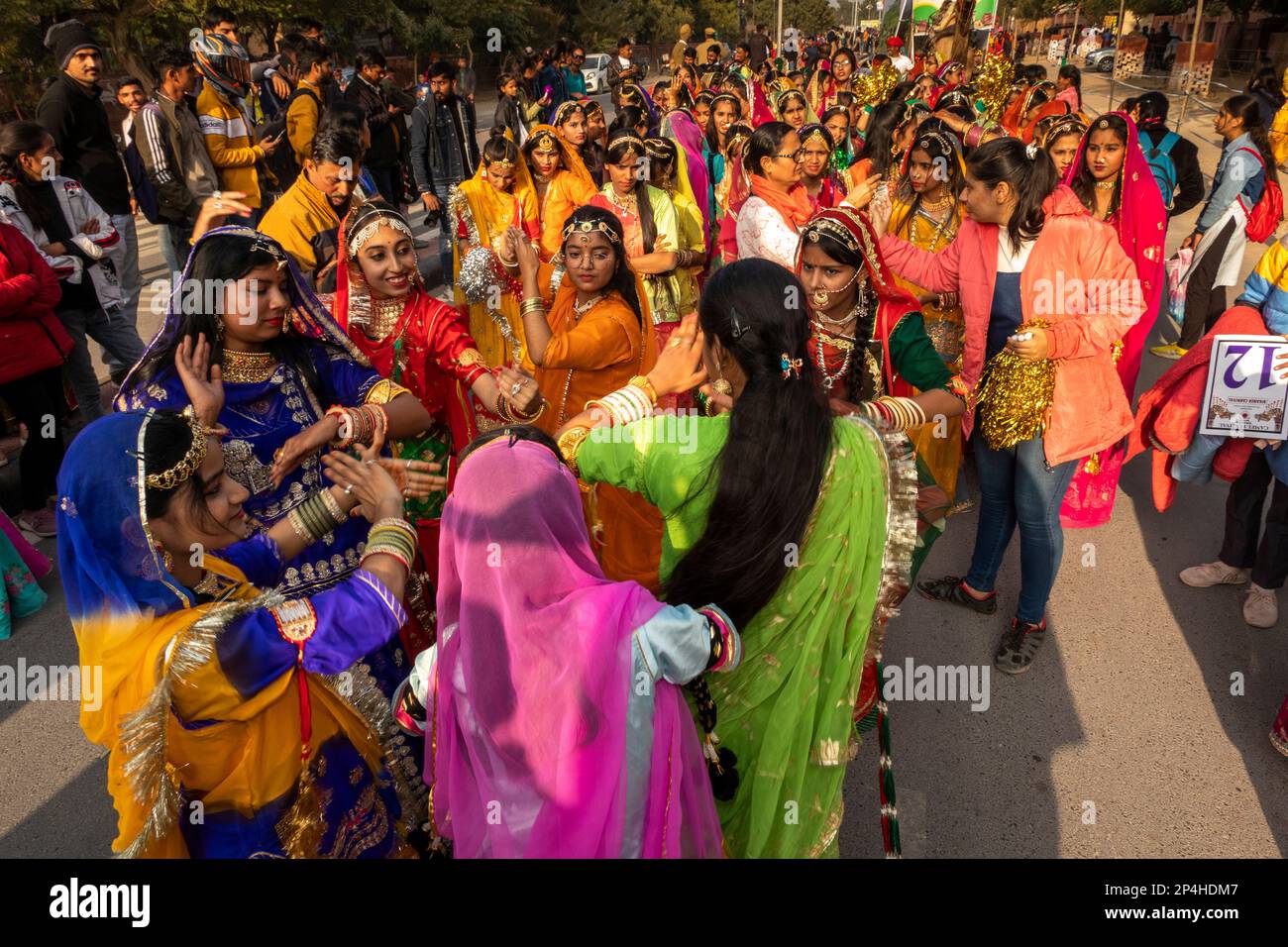 India, Rajasthan, Bikaner, Camel Festival Parade, culture, female dancers in traditional Rajasthani dress Stock Photo