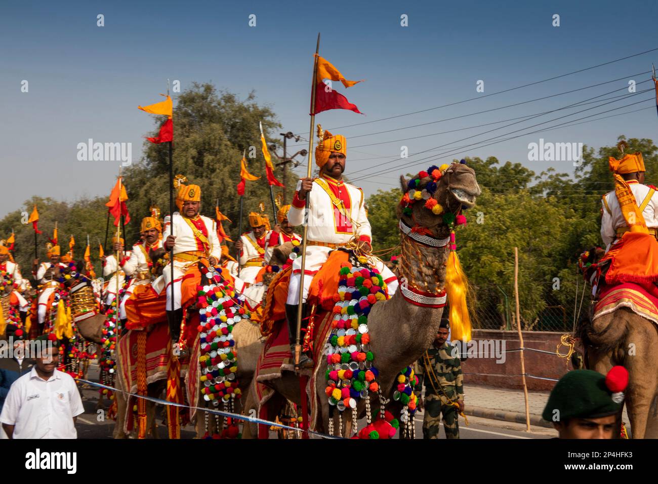 India, Rajasthan, Bikaner, Camel Festival Parade,  camel-mounted Border Security Force soldiers in dress uniform Stock Photo