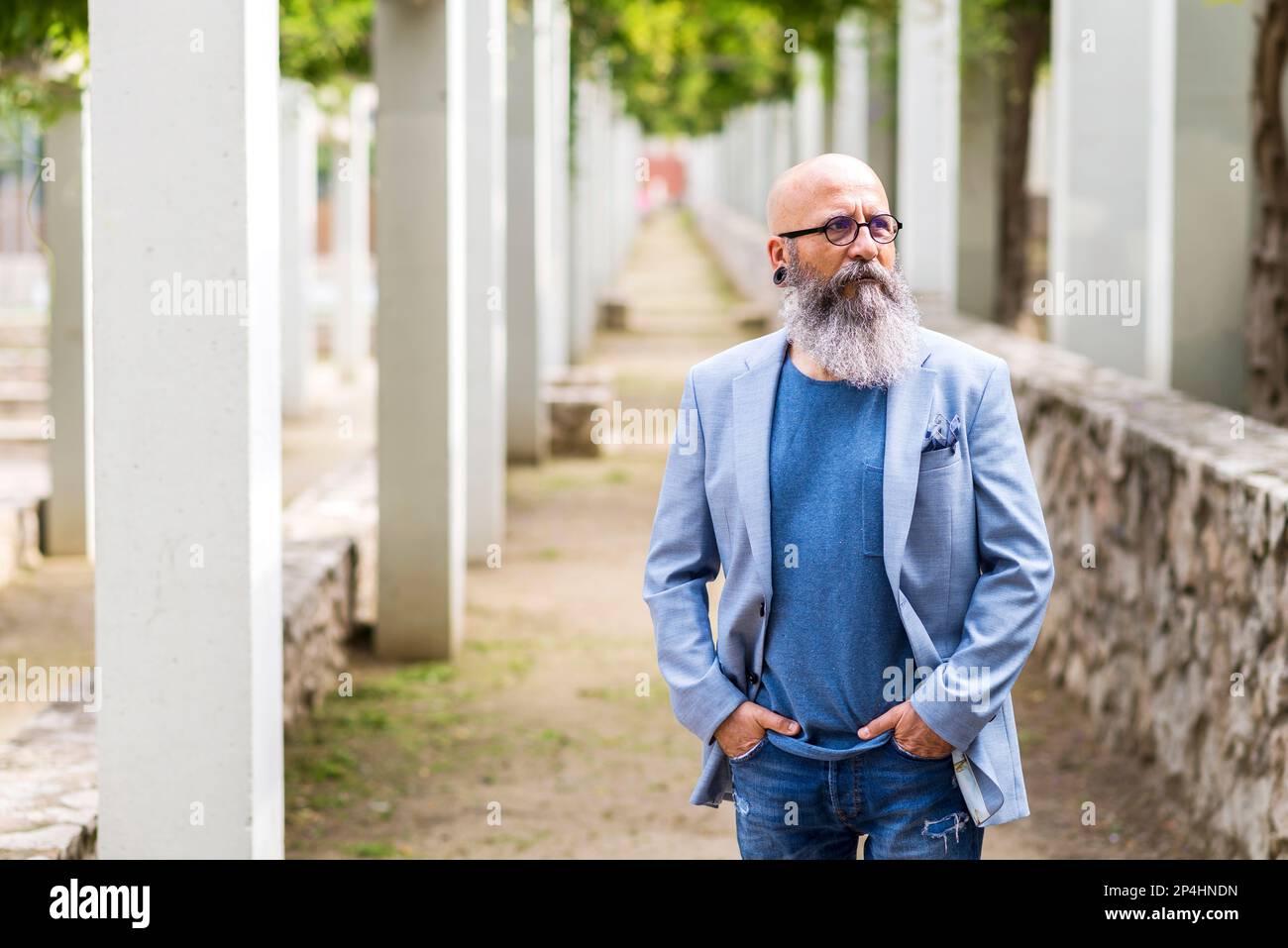 Relaxed old man posing hands hi-res stock photography and images - Alamy