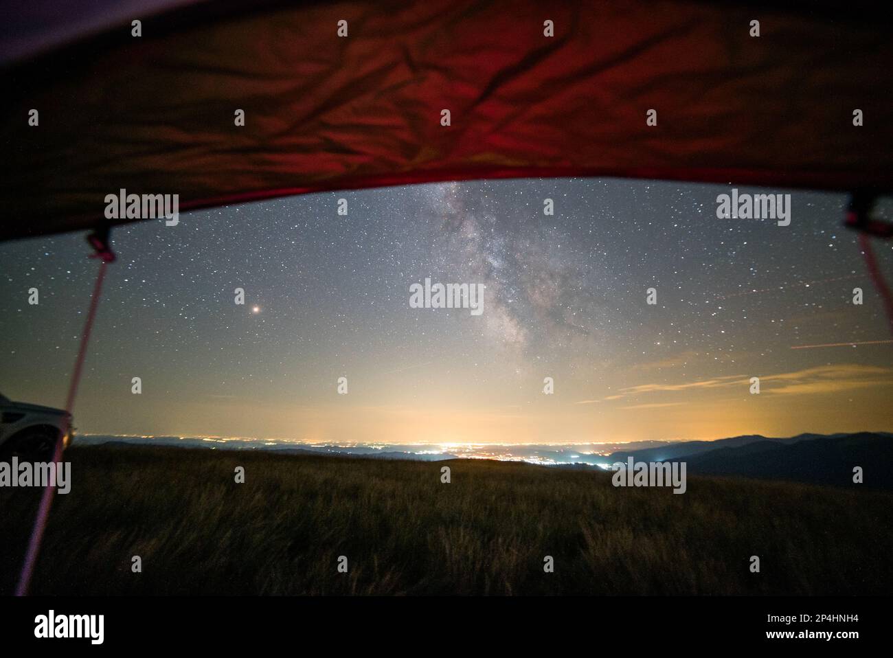 Milky way in the Summer from the Tent Stock Photo