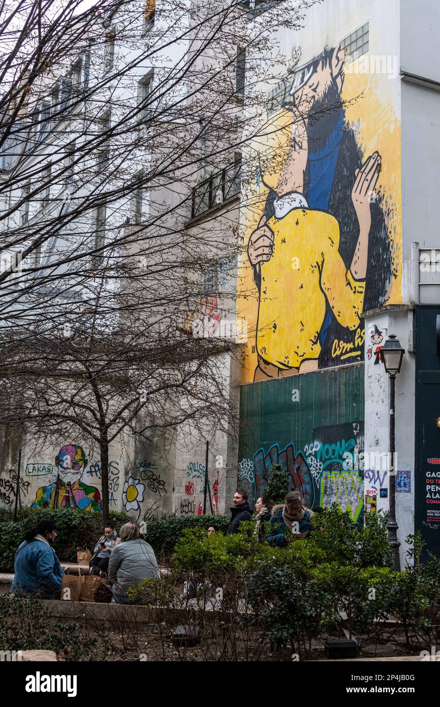 LBGT street art of Captain Haddock and Tintin kissing in Rue des Petits Carreaux Paris. Stock Photo