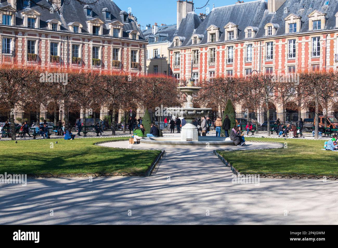 Place Des Vosges in the Spring Sunshine, Marais, Paris, France. Stock Photo