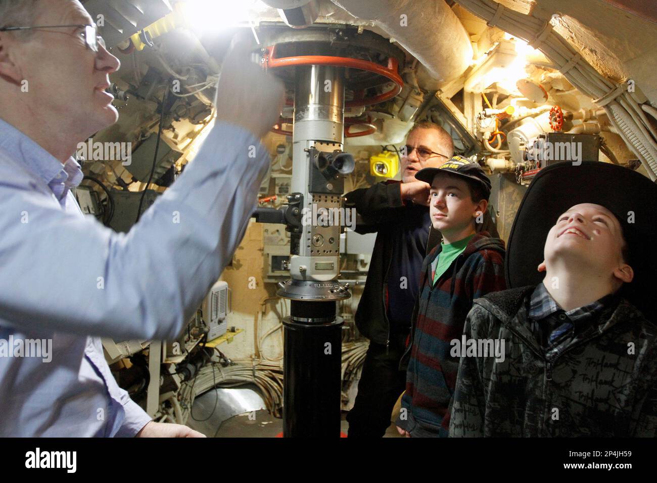 Port of Benton Engineer Roger Wright, left, shows the navigation system ...