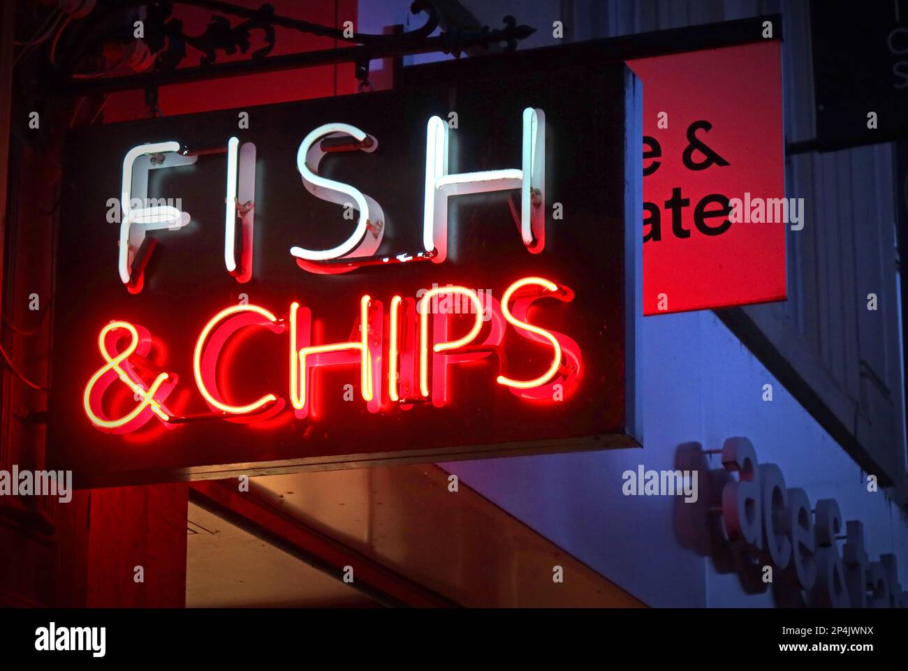 Frying tonight - British traditional food, the favourite fried Fish & Chips, neon sign, Bold Street, Liverpool, Merseyside, England, UK Stock Photo