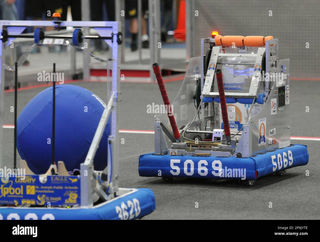 Teams compete Friday, March 28, 2014, during the 2014 FIRST Robotics ...
