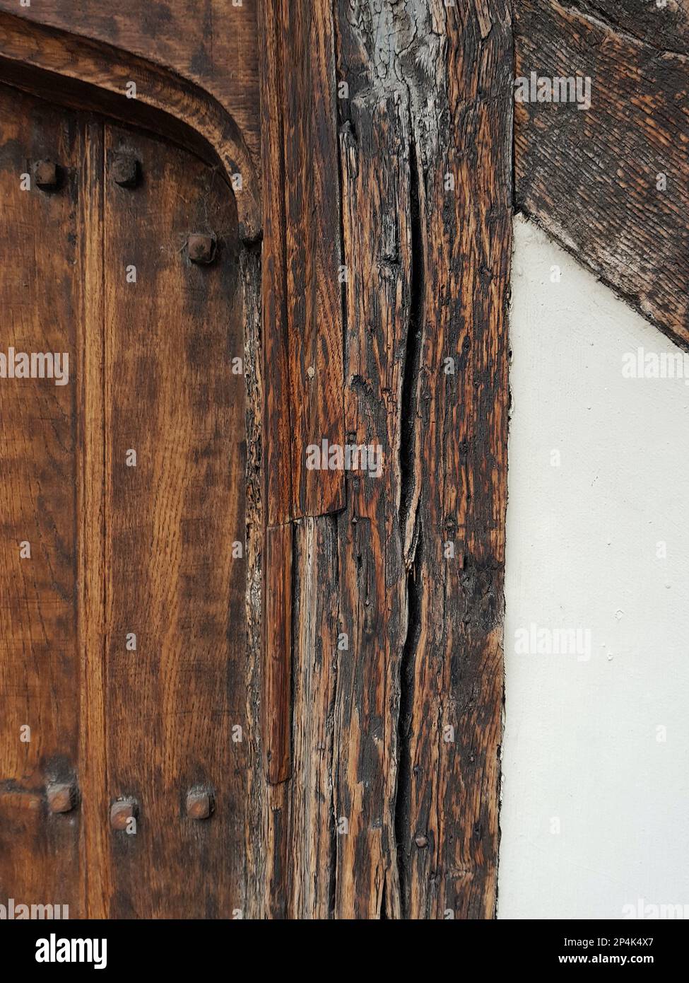 Detail of a traditional studded wood panelled door. Stock Photo