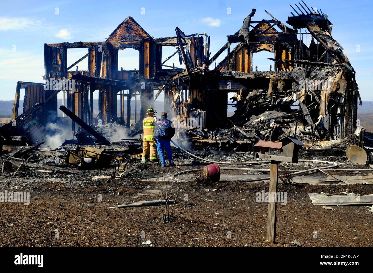 In this photo from March 23, 2014, officials respond the scene of a