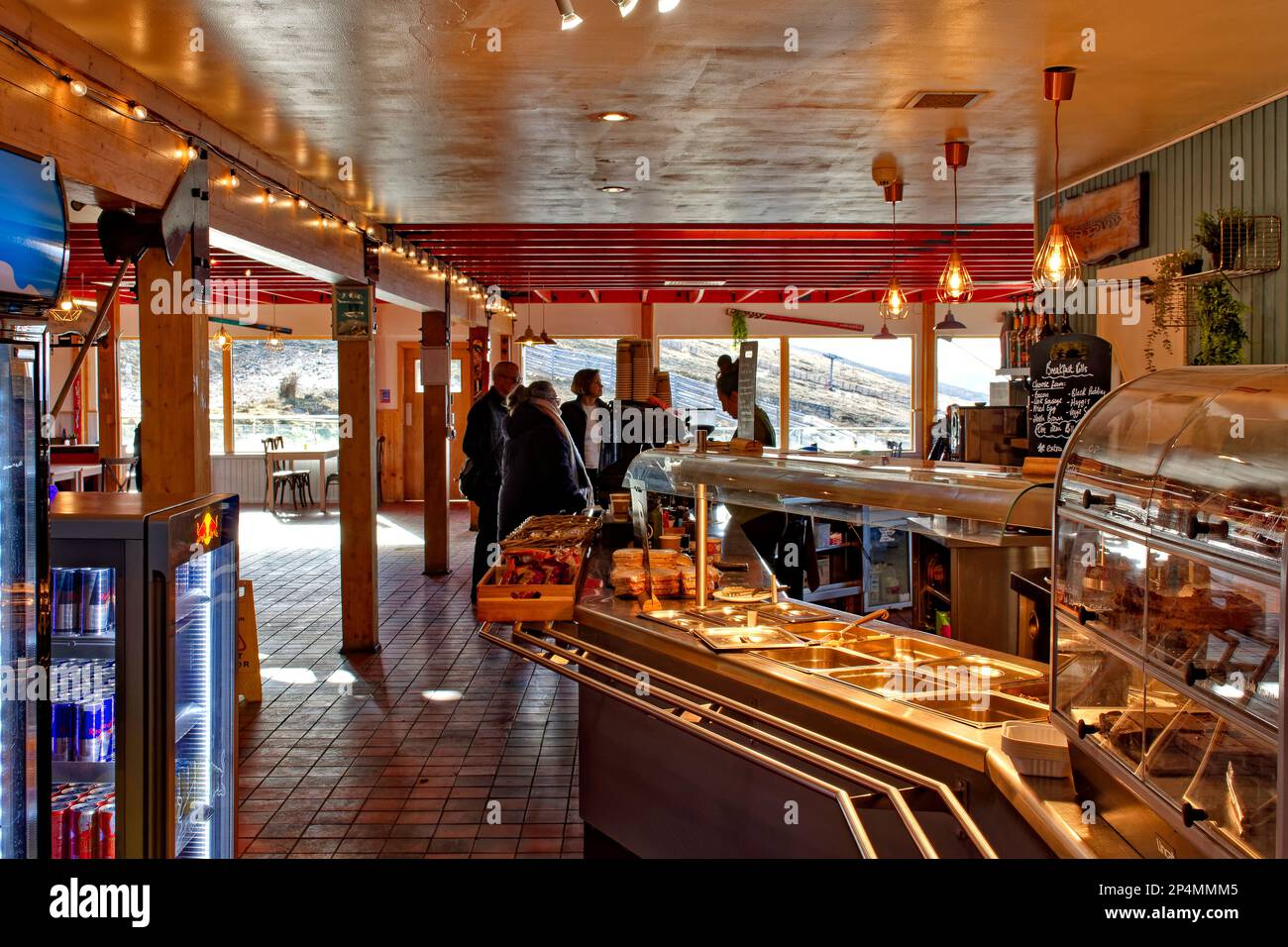 Fort William Aonach Mor Mountain Nevis Range food counter and people