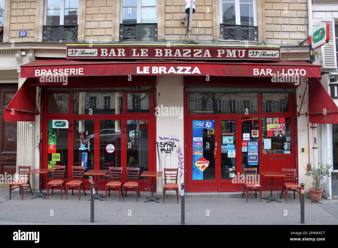 View of a typical Parisian brasserie and bar here located on the Boulevard du Temple in the 11th district of the city. Stock Photo
