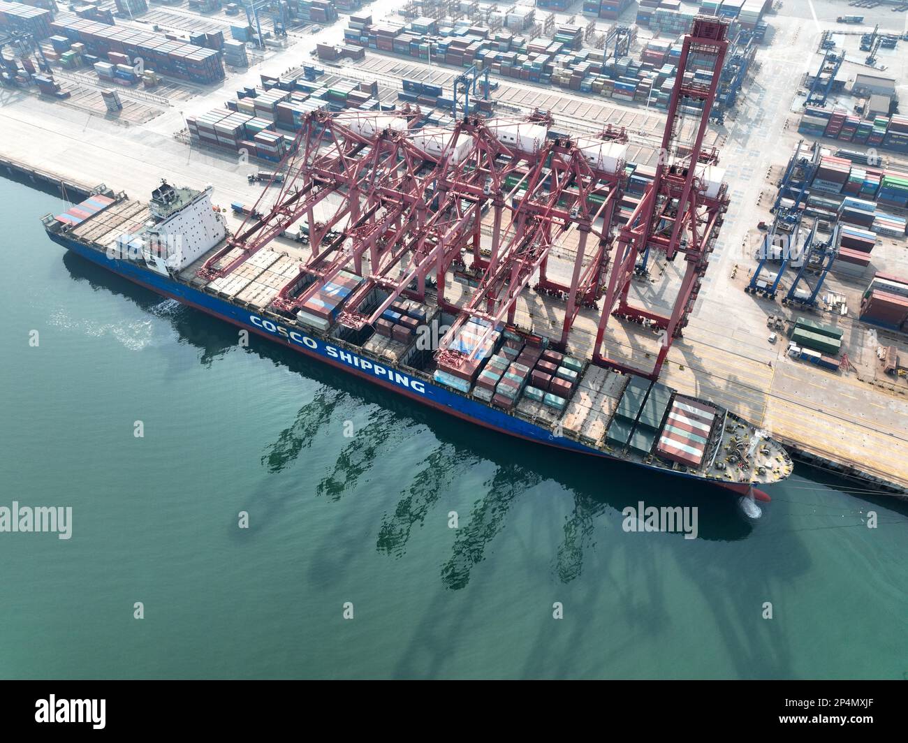 Aerial photo shows the busy scene at the container terminal of ...