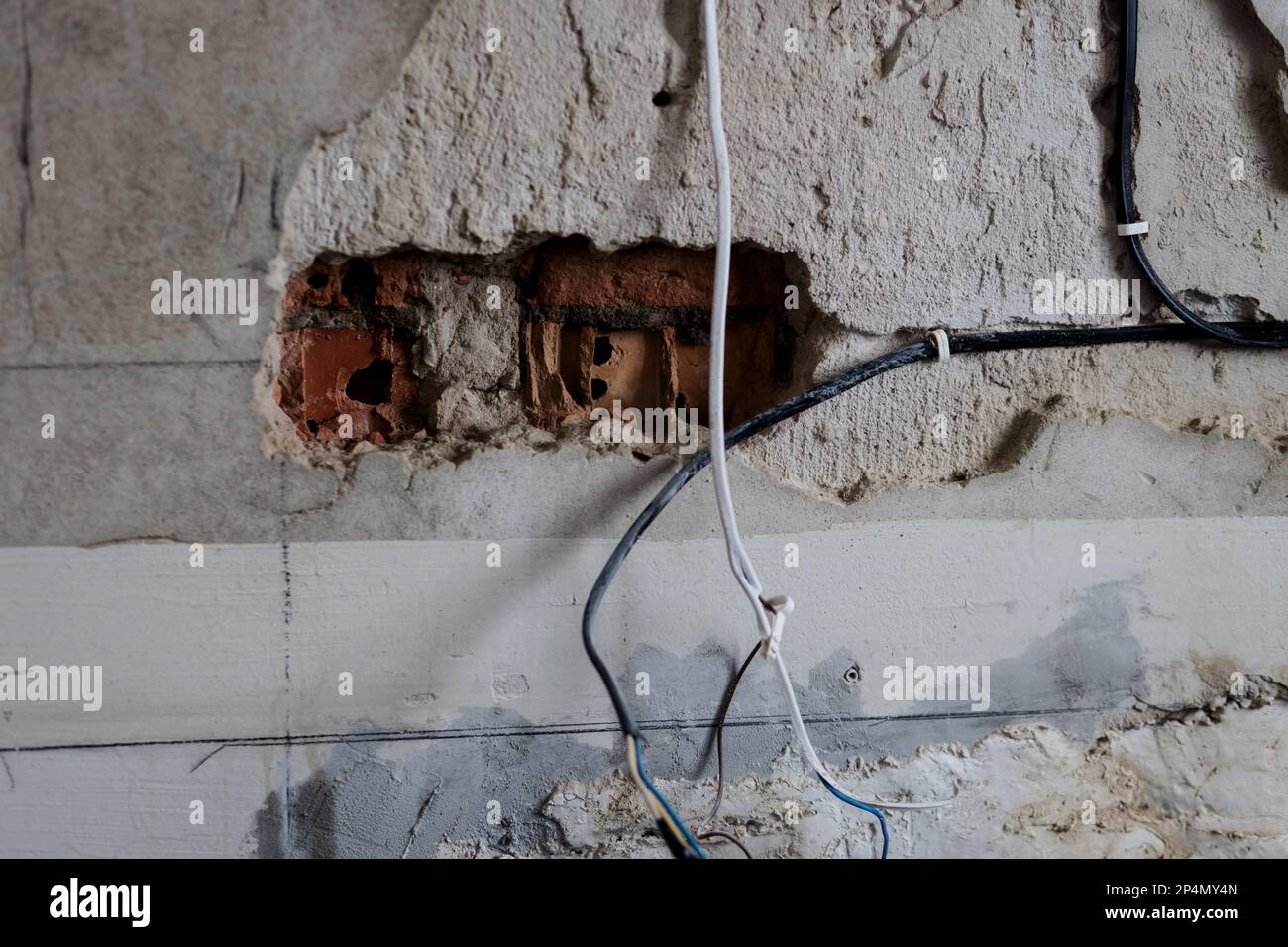 Electric wires in the wall. wiring reconstruction Stock Photo Alamy
