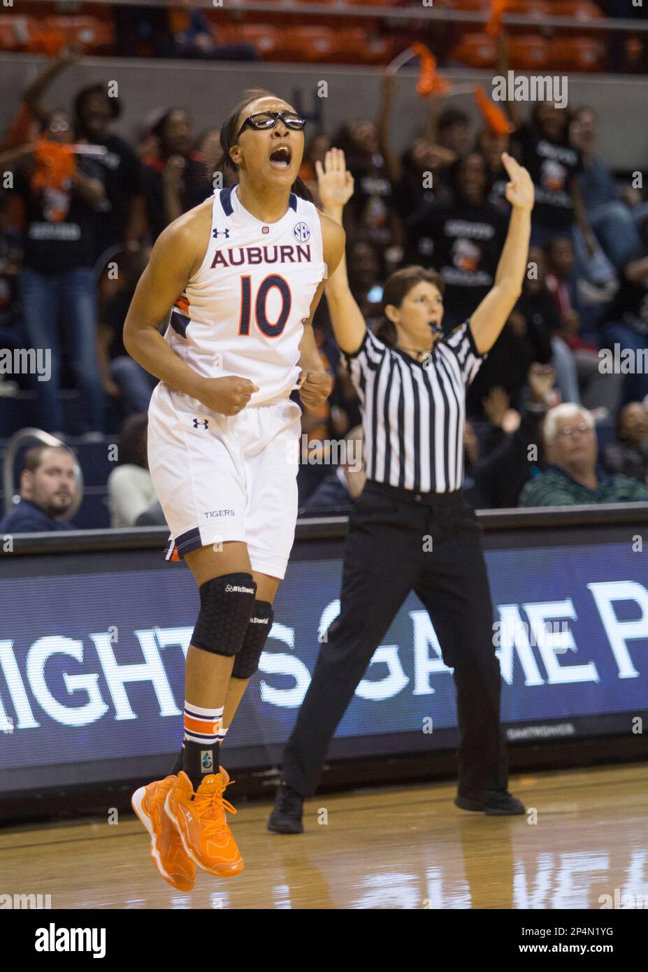 Auburn's Brandy Montgomery (10) celebrates after her 3-point basket to pull  within two points of Alabama during an NCAA college basketball game on  Thursday, Feb. 27, 2014, at in Auburn, Ala. (AP