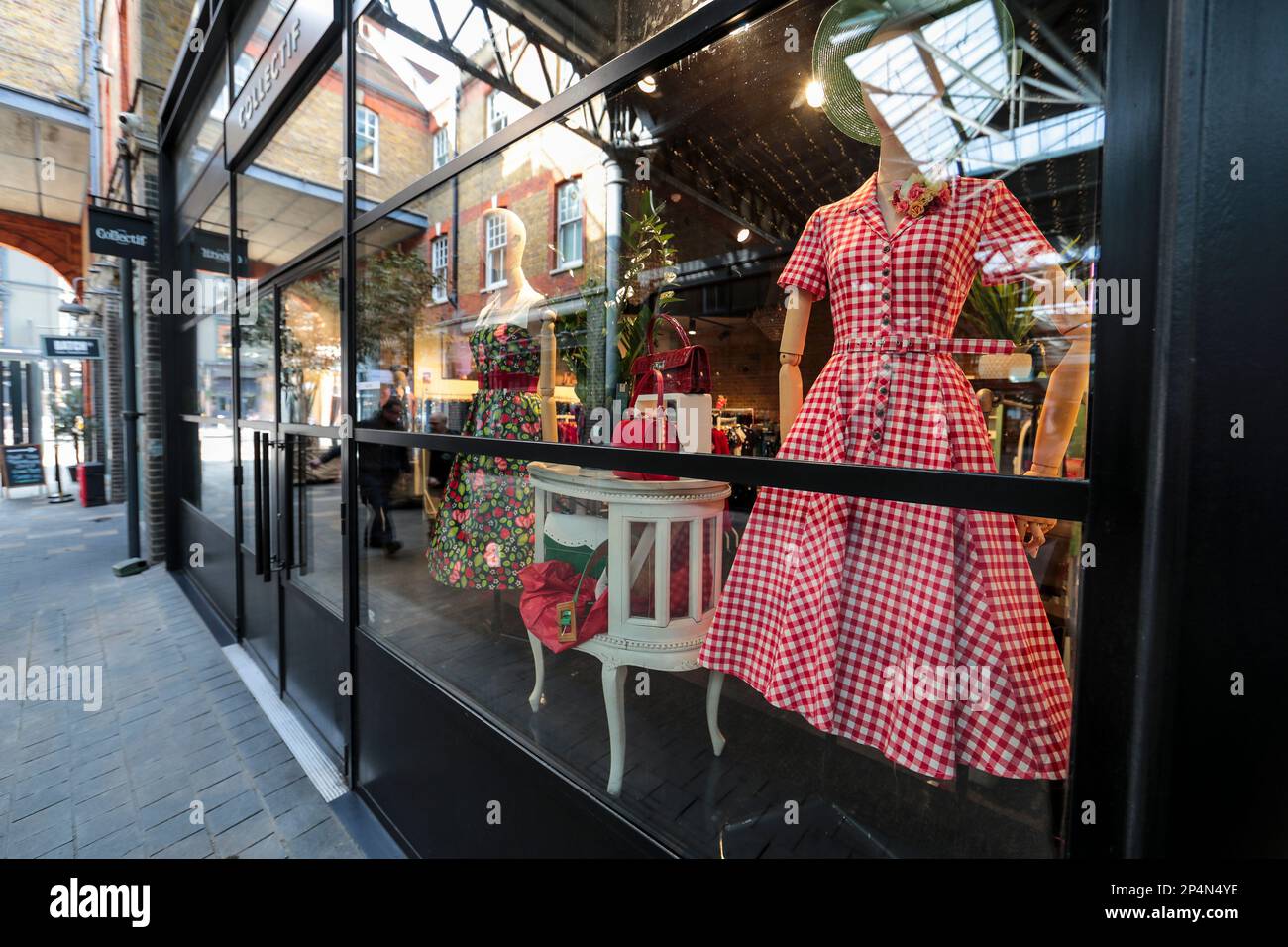 Red Dress In A Fashion Store Window Spitalfields Market London Stock 
