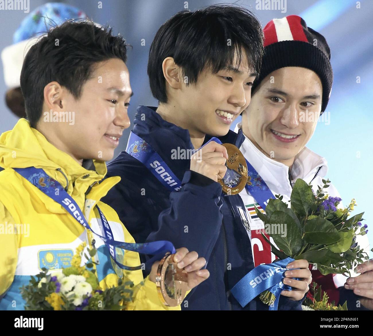 (LR) Kazakhstan's Denis Ten, bronze, Japan's Yuzuru Hanyu, gold and