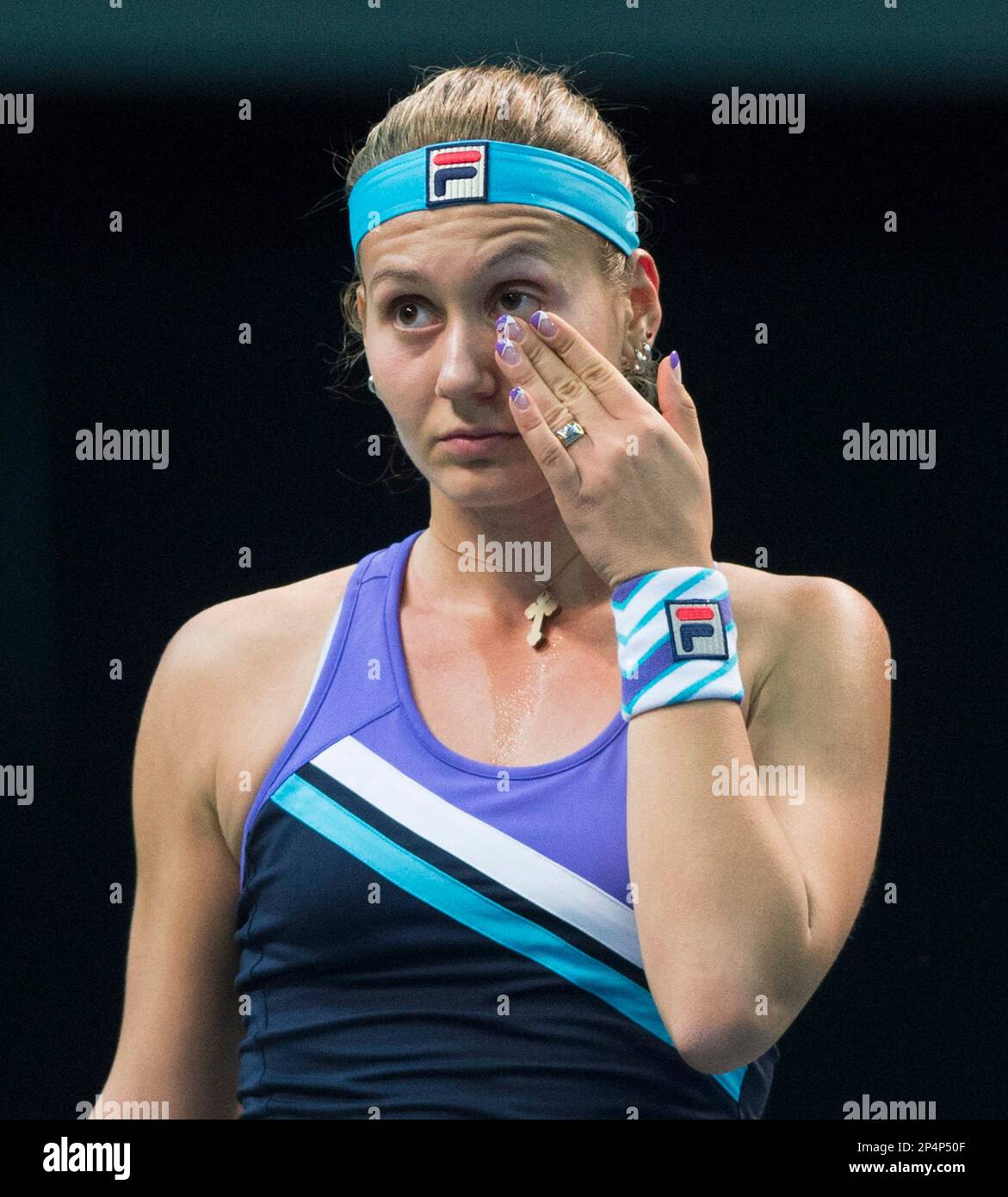Serbia's Jovana Jaksic reacts as she plays Canada's Eugenie Bouchard during  a Federation Cup tennis match in Montreal, Saturday, Feb. 8, 2014. (AP  Photo/The Canadian Press, Graham Hughes Stock Photo - Alamy