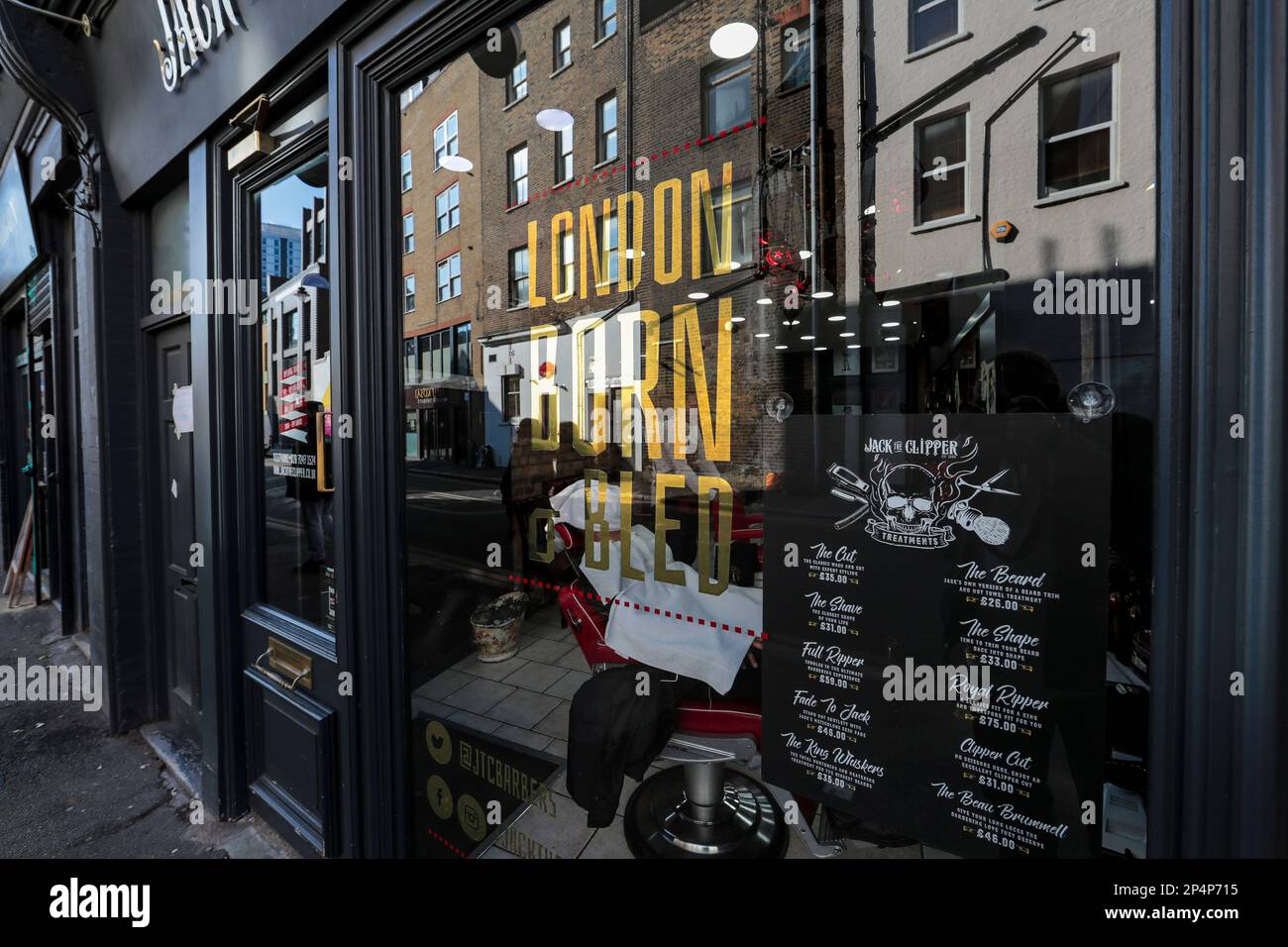 Jack the Clipper barbers shop, Toynbee Street, London E1 Stock Photo Alamy
