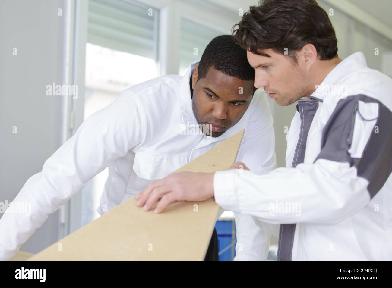 two wood workers in carpentry Stock Photo